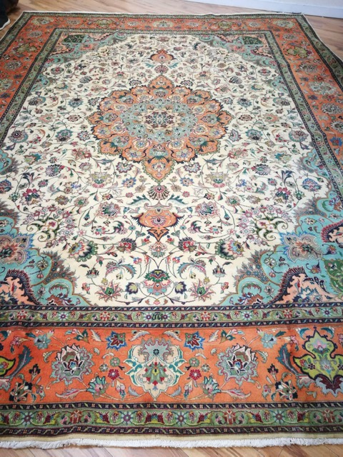 A Tabriz carpet 405 x 305cm